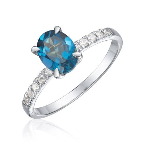 Ring Olivia i hvitt gull med 0,12ct WSI og topas oval midtstein