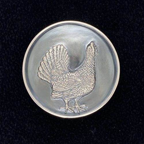 Villmarkknappen - Tiur