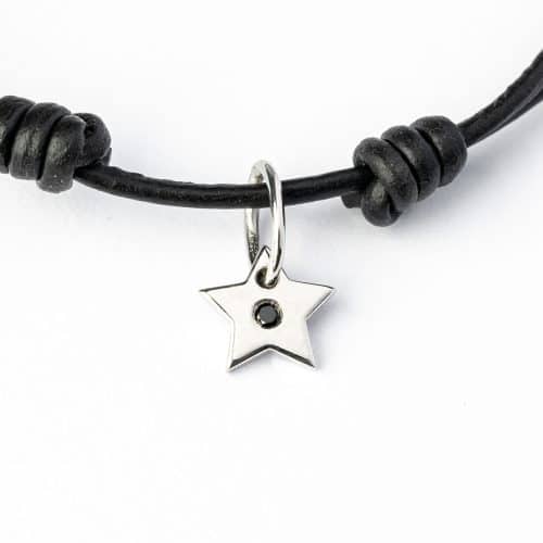 Star pendant 925s RH polished 1 x 7 mm, 1 x 0,015 ct. black diamond